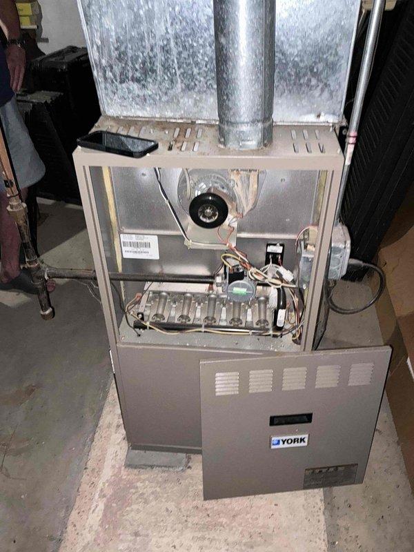 Conducted comprehensive system evaluation and presented full replacement options for dual-zone HVAC system. Inspected existing York furnace unit, documented internal components including blower motor assembly, heat exchanger, burner assembly, gas valve, igniter, control boards, and electrical connections. Property equipped with two complete heating and cooling systems requiring equipment replacement proposals.