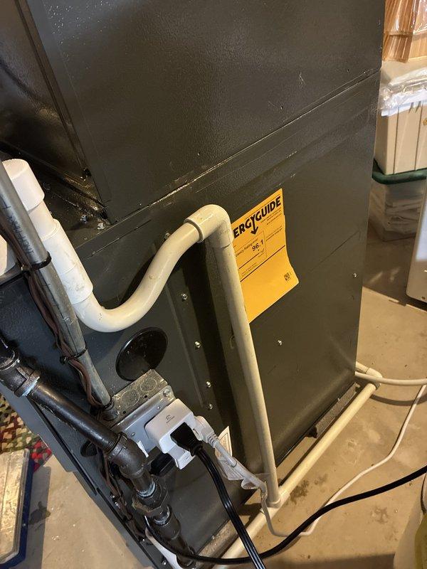 Completed warranty inspection and correction of HVAC installation deficiencies. Identified improper condensate drain line configuration with excessive run length, incorrectly installed P-trap, and wiring errors. Completely reinstalled condensate drainage system to manufacturer specifications, corrected all wiring connections, and properly configured P-trap to ensure adequate drainage and system protection.