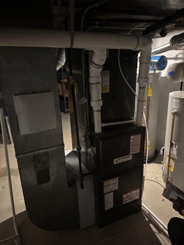 Completed installation of two air conditioning systems including relocation of condenser units to exterior side of residence. Both condensers were positioned on concrete pads with proper clearances and secured refrigerant line sets routed through exterior wall. Installed soft start kits on both units to reduce initial power draw and extend compressor life. Ran new electrical circuits from main panel to both outdoor units with appropriate wire gauge and overcurrent protection. Connected refrigerant lines to indoor air handlers in basement mechanical room, evacuated systems, and charged with manufacturer-specified refrigerant. Verified proper airflow, temperature differential, and electrical parameters on both systems. All equipment tested and confirmed operational.