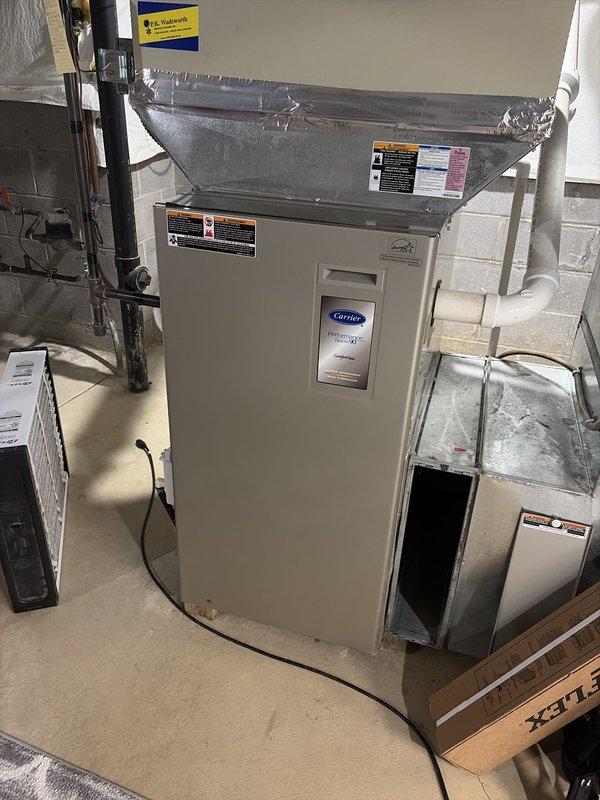 Completed scheduled preventive maintenance on Carrier air handler system with R-410A refrigerant. Measured and documented refrigerant pressures and temperatures: suction side reading 111.6 psig at 54.1°F with 17.3°F superheat, liquid side reading 308.3 psig at 86.5°F with 11.2°F subcooling. All refrigerant parameters found within manufacturer specifications, indicating proper system charge and operation. Inspected air handler unit, associated ductwork, and condensate drainage system with no deficiencies noted. System operating normally upon completion of maintenance visit.