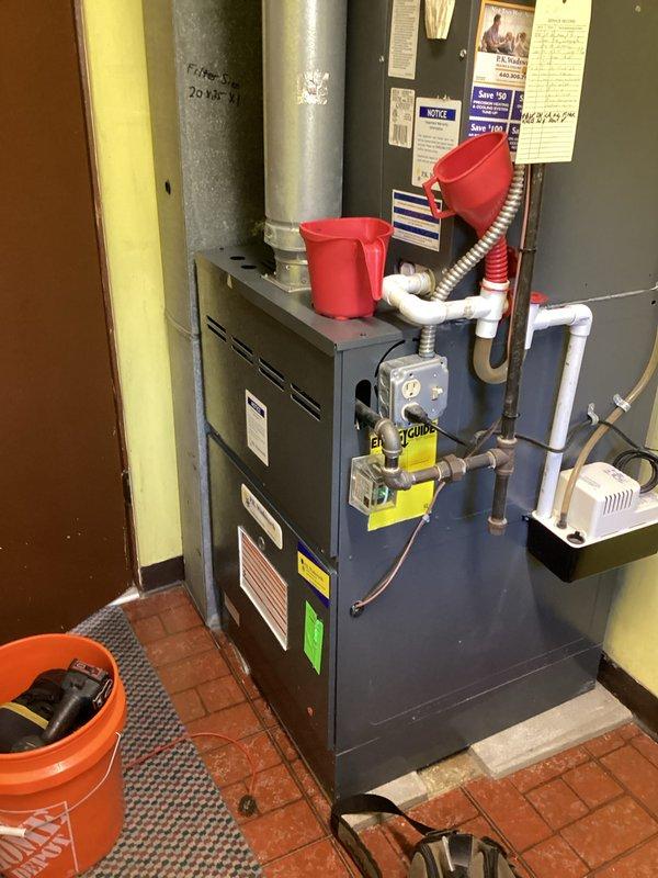 Completed preventive maintenance on residential HVAC cooling system. Performed comprehensive inspection of furnace unit, verified proper operation of all electrical components, and tested capacitor functionality using digital multimeter to ensure optimal system performance. Cleaned condensate drain lines and confirmed all safety controls, gas connections, and ductwork connections were secure and operating within manufacturer specifications.