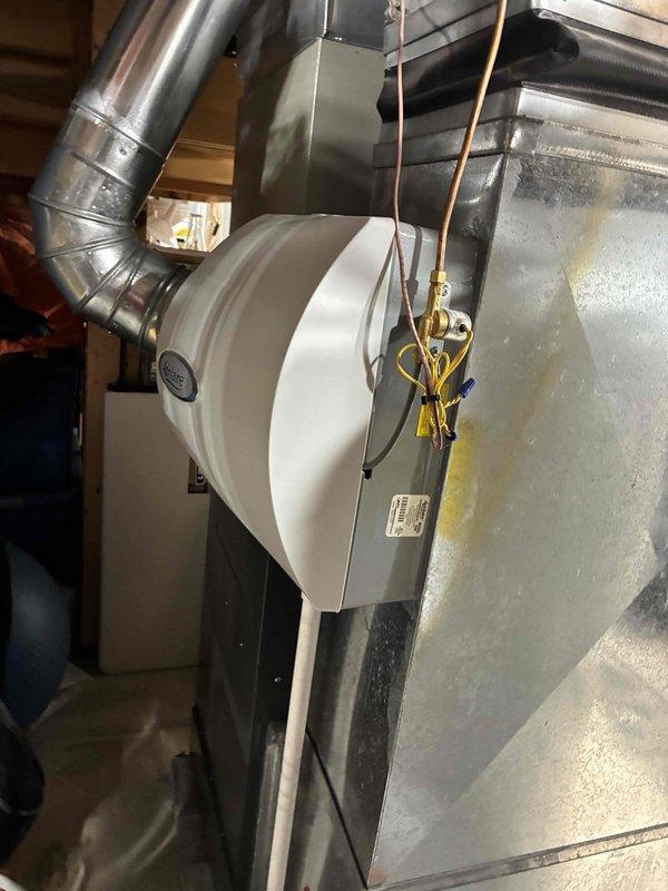 Completed routine preventive maintenance inspection on residential cooling system as part of ongoing service agreement. Inspected humidifier unit, ductwork connections, refrigerant lines, and air handling components for proper operation and condition. All system components found operating within normal parameters with no immediate service needs identified.