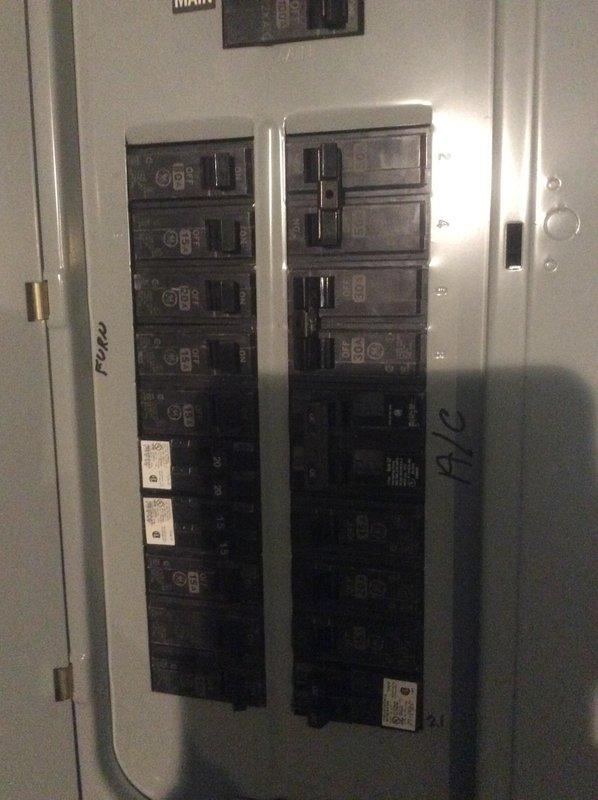 Responded to concern regarding breaker compatibility in existing electrical panel serving mini split system installed three years prior. Upon inspection, verified that the 2-pole 20-amp Challenger breaker installed in the GE panel met all applicable electrical code requirements at the time of installation and continues to function safely. Documented panel configuration with photographs showing proper wire connections, breaker mounting, and overall panel condition. Explained to customer that while arc fault circuit interrupter (AFCI) breakers provide additional protection and may be required for certain circuits under current code, the existing standard breaker installation remains code-compliant for this dedicated mini split circuit and poses no safety concern.