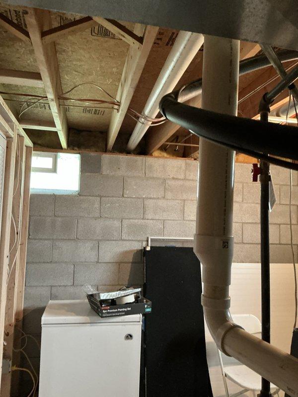Conducted on-site assessment of existing HVAC system in residential basement mechanical room to provide equipment replacement options. Documented current furnace and surrounding utility infrastructure, including water heater, support columns, and available clearances for new equipment installation. Photographed existing conditions to develop accurate replacement proposal specifications.