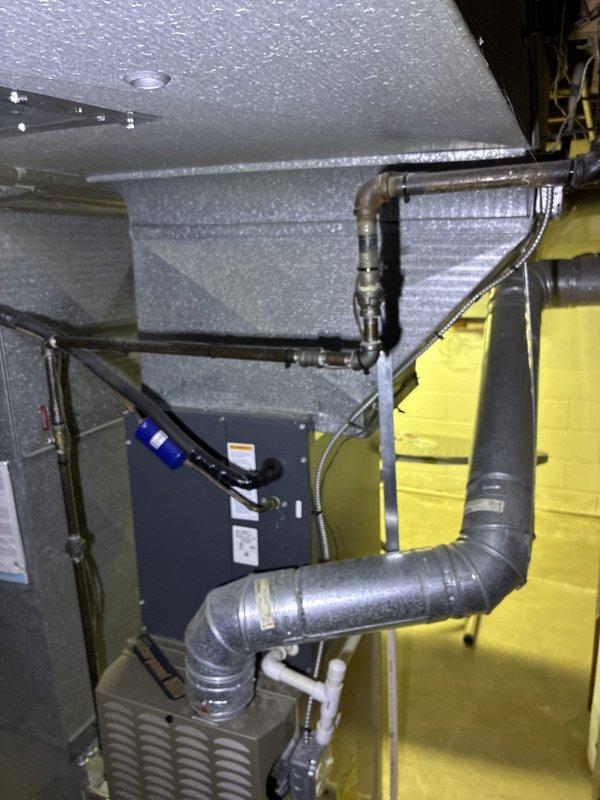 Conducted on-site evaluation for hot water tank replacement in residential mechanical room. Assessed existing HVAC infrastructure including ductwork configuration, electrical panel capacity with main breaker and circuit arrangement, and utility connections to determine installation requirements and compatibility for new water heating equipment.