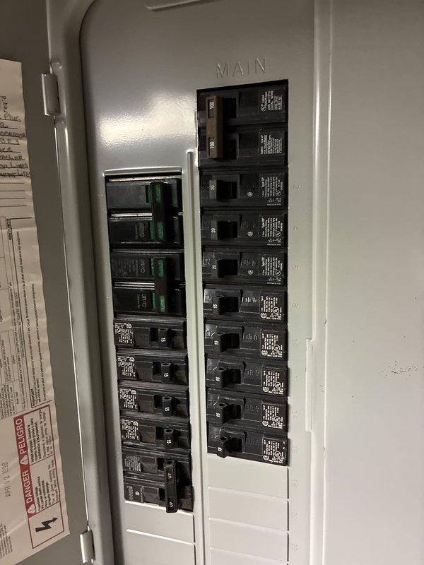 Conducted on-site evaluation for hot water tank replacement in residential mechanical room. Assessed existing HVAC infrastructure including ductwork configuration, electrical panel capacity with main breaker and circuit arrangement, and utility connections to determine installation requirements and compatibility for new water heating equipment.