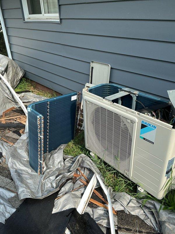 Replaced failed evaporator coil, control board, and temperature sensor on Daikin split system air conditioning unit. Evacuated system, pressure tested for leaks, and recharged with 5 pounds of R-410A refrigerant to manufacturer specifications. Verified proper system operation and temperature differential upon completion.