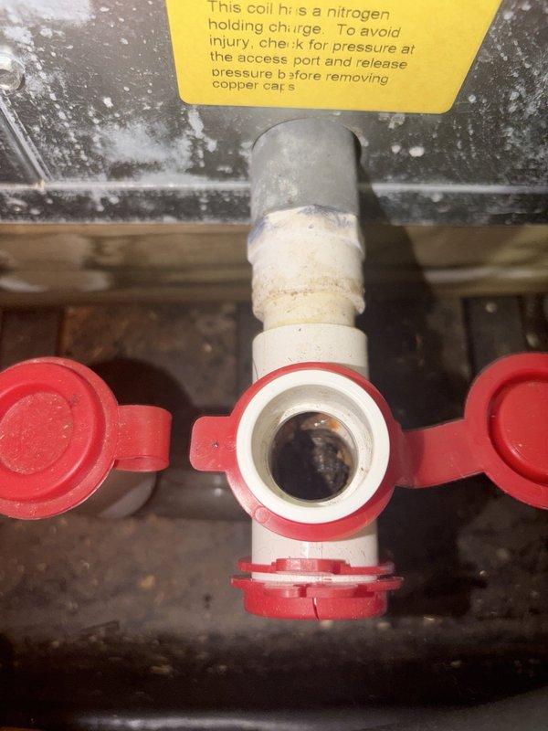Completed routine cooling maintenance on residential attic-mounted HVAC system. Inspected heating unit, ductwork connections, and refrigerant line components including service valves with protective caps. All equipment found in operational condition with standard wear patterns consistent with regular use.
