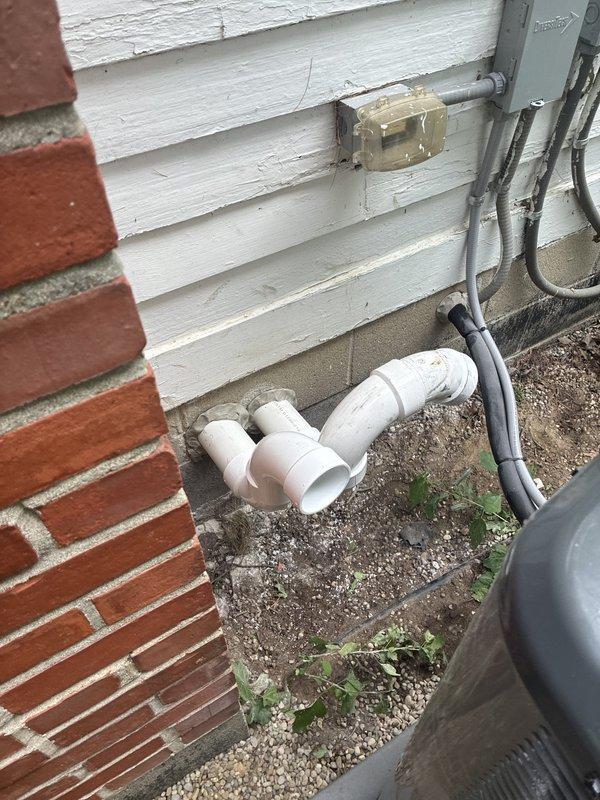 Completed full HVAC system installation including a 96% efficiency furnace and air conditioning unit with integration of existing return ductwork. Installed new control boards, wiring harnesses, and electrical connections within the furnace cabinet, routed PVC condensate drain piping at exterior foundation, and established proper electrical service connections including conduit and disconnect panel.
