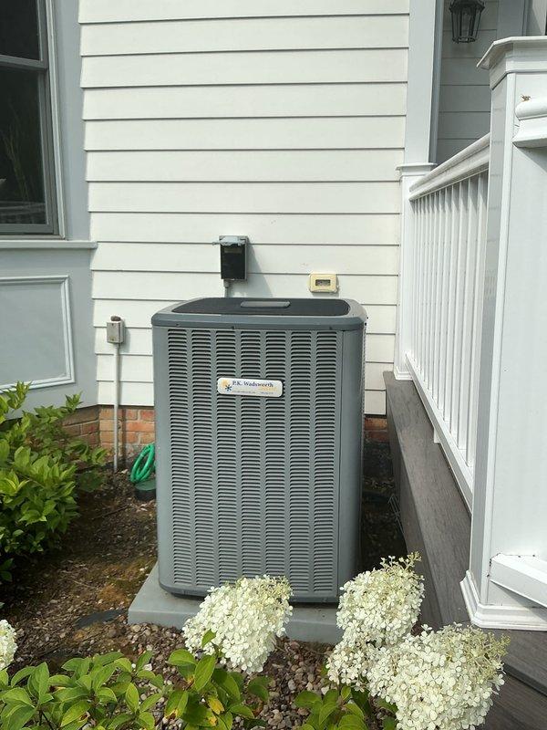 Responded to service call for non-functioning air conditioning unit. Upon arrival, inspected outdoor condenser unit located in side yard against house exterior. Unit was found to be inoperative and required technical assessment to diagnose the malfunction and restore cooling system to proper working condition.