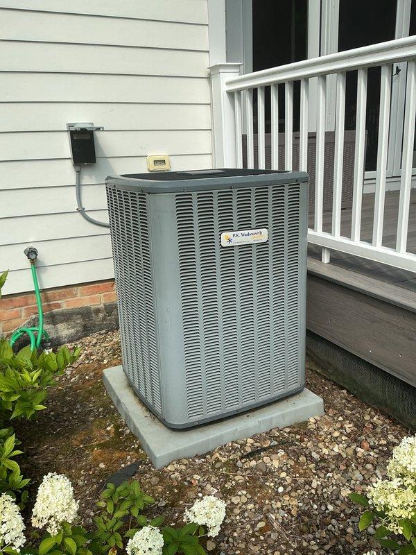 Responded to service call for non-functioning air conditioning unit. Upon arrival, inspected outdoor condenser unit located in side yard against house exterior. Unit was found to be inoperative and required technical assessment to diagnose the malfunction and restore cooling system to proper working condition.
