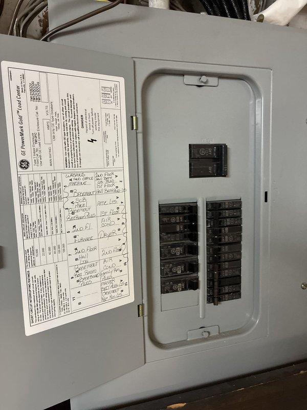 Conducted HVAC system evaluation for air conditioning replacement options in attic location accessible by walk-up ladder. Assessed existing electrical infrastructure and circuit panel configuration to determine compatibility with potential new AC unit installation. Documented current electrical service capacity, circuit breaker arrangement, and panel specifications to provide accurate equipment replacement recommendations and compare installation costs versus repair alternatives.