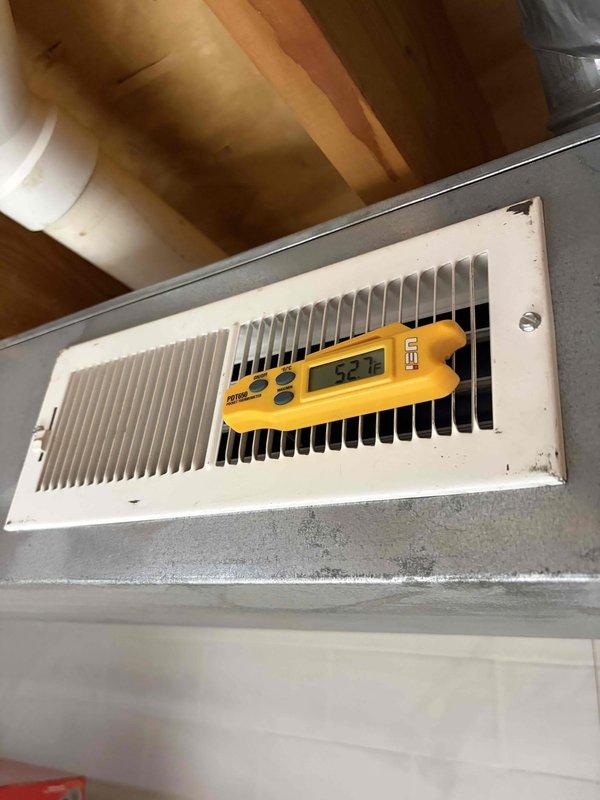Completed routine cooling system maintenance visit on residential HVAC unit. Performed comprehensive inspection of electrical control panel, verifying proper operation of capacitor, contactor, and all associated wiring connections. Utilized CoreSense diagnostic equipment to assess system performance and electrical parameters. Measured supply air temperature at floor register, confirming 52.1°F output, which indicates proper cooling operation and adequate refrigerant charge. All components found in good working condition with no repairs required.
