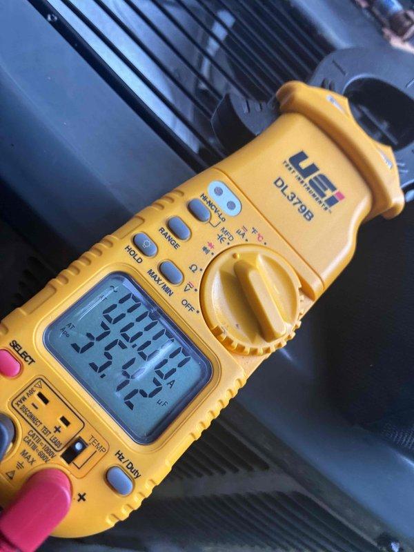 Performed comprehensive maintenance on cooling system serving eight zones. Conducted thorough inspection of evaporator coil assembly, noting mesh filter condition with minor dust accumulation and discoloration patterns consistent with normal operation. Verified electrical parameters using calibrated digital multimeter, confirming voltage reading of 232.2V within acceptable range for system specifications. Inspected condensate drainage line for proper function and motor assembly for signs of wear or abnormal operation. All components operating within manufacturer specifications upon completion of preventive maintenance service.