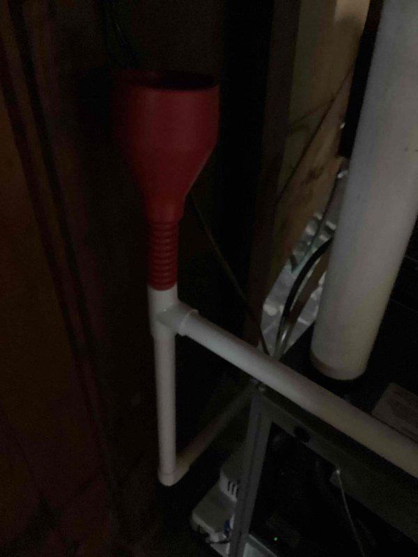 Completed routine HVAC cooling system maintenance inspection. Verified system operation and documented temperature readings at 5°F, indicating proper cooling performance. Inspected condensate drain line assembly and confirmed proper drainage function with no blockages present.