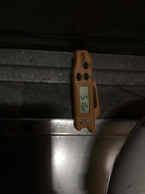 Completed routine HVAC cooling system maintenance inspection. Verified system operation and documented temperature readings at 5°F, indicating proper cooling performance. Inspected condensate drain line assembly and confirmed proper drainage function with no blockages present.