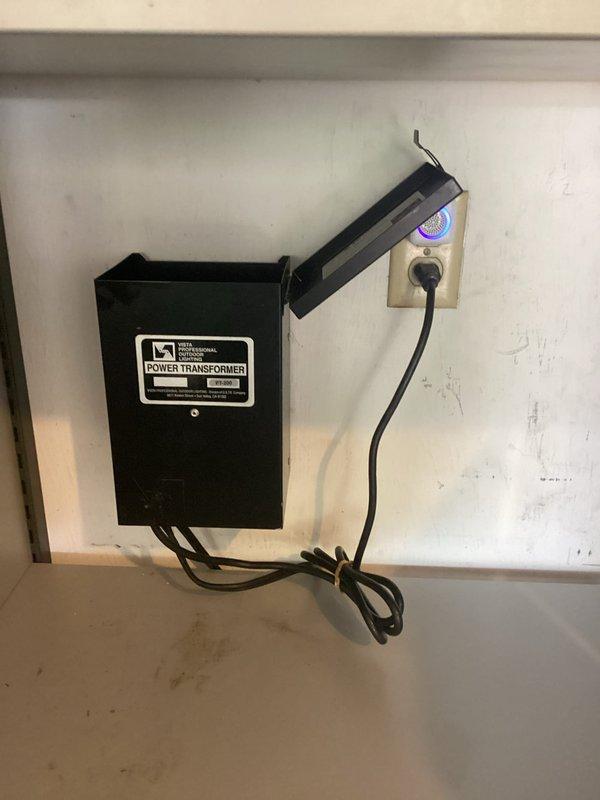 Replaced malfunctioning landscape light fixture and transformer in outdoor lighting system. Troubleshot additional non-functioning light per customer request, traced wiring to power transformer mounted in interior utility space, verified proper connections and power supply to complete repair of landscape lighting circuit.