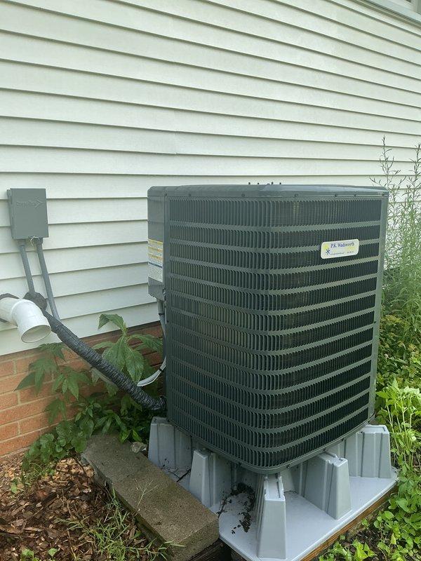 Responded to service call for residential air conditioning system reported to have diminished cooling performance. Performed comprehensive seasonal cooling maintenance inspection on outdoor condenser unit and indoor air handler system. Conducted diagnostic temperature measurements at air handler using calibrated digital thermometer to assess system performance and airflow temperatures. Visually inspected outdoor condenser unit positioned on mounting pad, verified proper clearance from surrounding vegetation, and checked electrical disconnect box and conduit connections. Evaluated indoor air handler installation in attic space, including ductwork connections and flexible supply ducts. System operational parameters were measured and recorded to determine cooling efficiency and identify any performance deficiencies requiring corrective action.