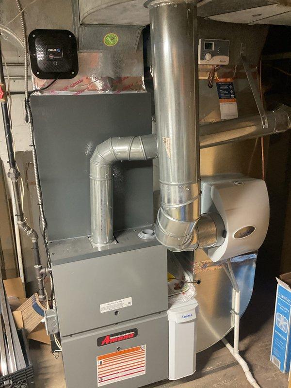 Completed scheduled HVAC cooling maintenance on residential system. Performed comprehensive inspection of furnace and air conditioning equipment, verified proper airflow through ductwork and plenum assembly, and measured supply air temperature at 49.9°F confirming adequate cooling performance. All components operating within normal parameters with no deficiencies noted.