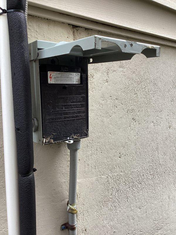 Completed comprehensive cooling system tune-up on outdoor condensing unit, including refrigerant pressure diagnostics, electrical connection inspection, and system performance verification. Addressed exterior biological growth concerns around unit location and confirmed all electrical components, including disconnect switch and terminal connections, are functioning properly. Unit operating within manufacturer specifications with all safety checks passed.