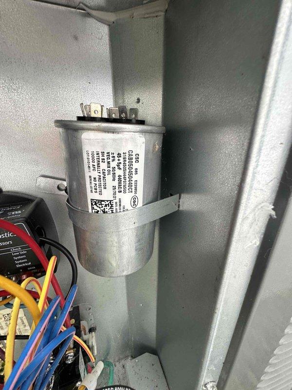 Completed routine cooling system maintenance on residential air conditioning unit. Performed comprehensive inspection of electrical components including capacitor testing and amperage readings on condenser unit. All components operating within normal specifications, system cooling properly with no issues identified.