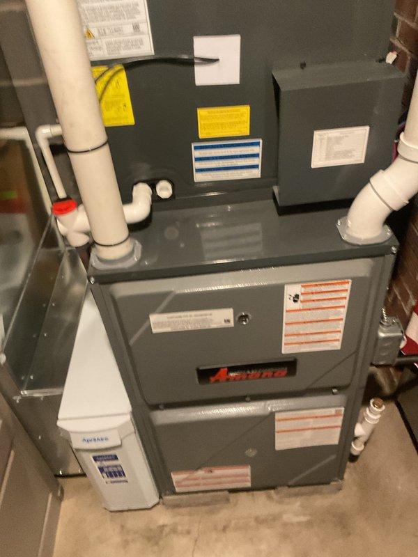 Completed routine cooling maintenance on residential HVAC system. Performed comprehensive inspection of multi-component unit including furnace, air handler, and condensate management system. Verified ambient temperature readings at 73.1°F using calibrated digital measuring instrument. Inspected all equipment labels, safety warnings, and manufacturer specifications for compliance. Confirmed proper operation of PVC condensate drain lines and verified system clearances meet installation standards. All components found in good working condition with no visible damage or deterioration noted.