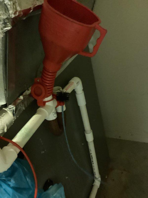 # HVAC Cooling Maintenance Summary

Completed comprehensive preventive maintenance service on aging air conditioning system as part of recurring maintenance program. Performed electrical diagnostics using professional-grade multimeter to verify system voltage and amperage readings, ensuring proper compressor and blower motor operation. Inspected condensate drain system, confirmed proper drainage through PVC piping assembly and collection funnel to prevent water damage and overflow conditions.

# Detailed Work Performed

**Electrical System Testing and Verification**
Conducted thorough electrical diagnostics on cooling system components using calibrated digital multimeter. Measured voltage supply to outdoor condensing unit and indoor air handler to verify proper power delivery. Tested amperage draw on compressor and blower motor circuits to confirm equipment operating within manufacturer specifications. All electrical readings documented and found to be within acceptable parameters for 