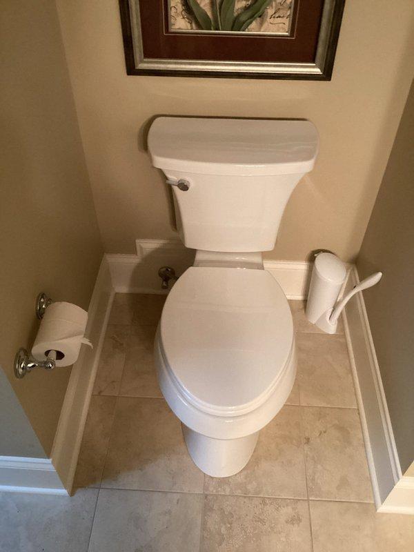 Returned to property to complete installation of three customer-supplied toilets in separate bathroom locations. Removed existing fixtures, installed new two-piece porcelain toilets with proper wax ring seals and floor flange connections, and tested all units for proper flush operation and leak-free performance.