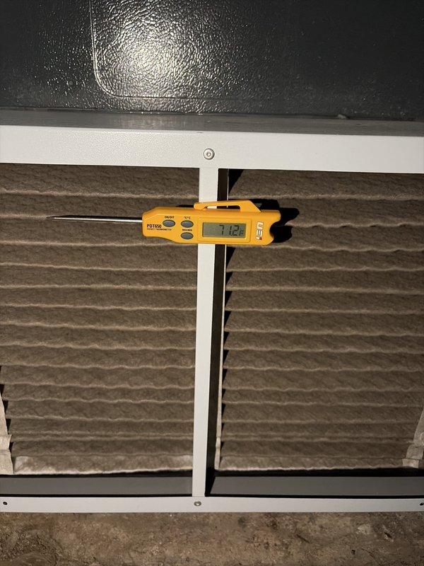 Completed annual preventative maintenance on residential split-system air conditioning unit. Performed comprehensive system inspection including temperature diagnostics at the air handler, measuring supply air temperature at 71.2°F through the filter assembly. Inspected dual outdoor condenser units positioned on exterior concrete pads, verifying proper operation and clearances. All components found operating within normal parameters with no deficiencies noted during this scheduled maintenance visit.