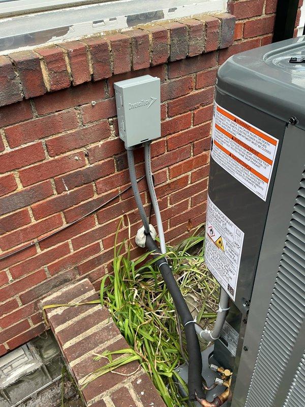 Responded to no cool call on recently installed HVAC system with thermostat communication failure. Upon arrival, verified outdoor condensing unit was properly installed with correct electrical disconnect and conduit routing per manufacturer specifications. Diagnosed thermostat-to-air handler communication issue preventing system operation. Restored proper communication between thermostat and equipment, confirmed system cooling functionality, and verified all components operating within normal parameters.