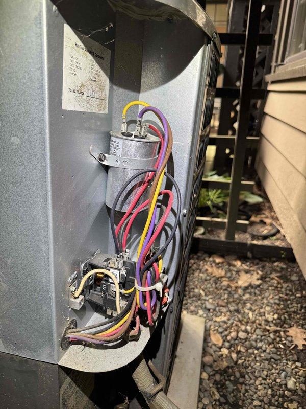 Completed routine HVAC cooling maintenance on outdoor condensing unit. Performed electrical diagnostics using clamp meter to verify proper amperage draw and system operation, inspected capacitor and contactor connections with all wiring in good condition, and documented equipment status through service photography.