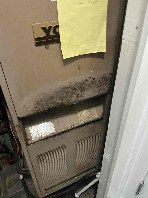 Conducted estimate for whole-house HVAC system replacement involving installation of new air conditioning unit where none currently exists and replacement of existing 40+ year-old furnace located in basement. Inspected aging furnace equipment showing significant wear, heavy dust accumulation, and deteriorated condition consistent with decades of operation, documenting current system configuration including refrigerant lines, electrical connections, and ductwork layout to provide comprehensive replacement recommendations.