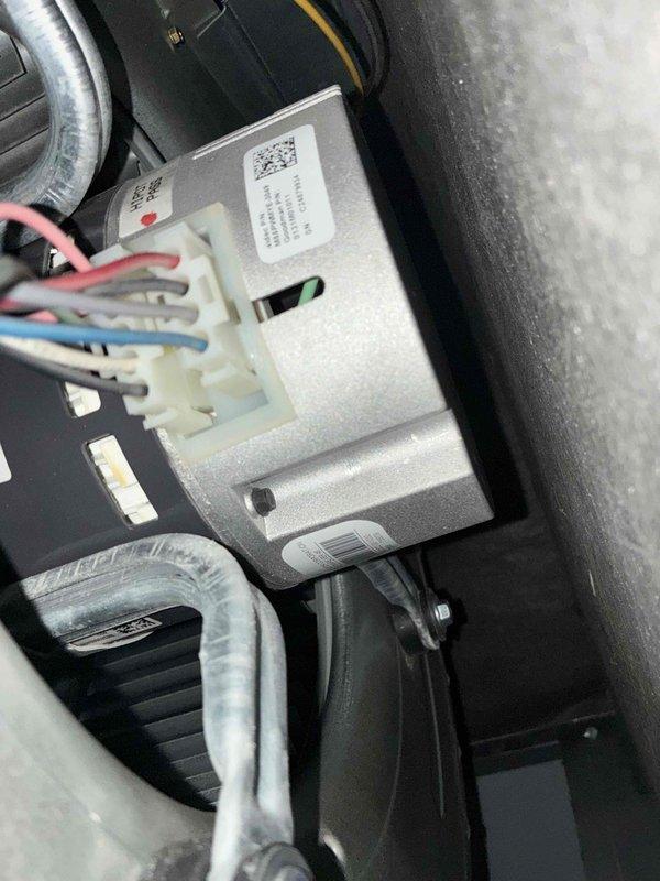 Completed preventive maintenance on residential HVAC cooling system. Inspected control module and electrical connections in attic-mounted air handler, verifying proper wire terminations and component functionality. Examined outdoor disconnect switch and fuse indicators, confirming operational status with no faults detected. All system components found in satisfactory working condition with no repairs required.