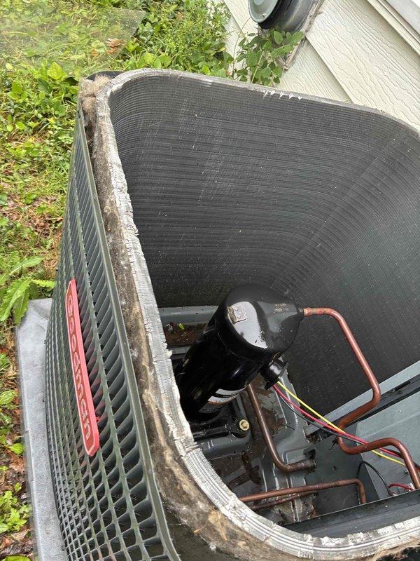 Performed chemical coil cleaning on Goodman condensing unit to remove heavy accumulation of dirt and debris from exterior surfaces and internal components. Installed two Zap Pro surge protectors to provide electrical protection for the HVAC system. Unit accessed per customer instructions, with property entry coordinated via phone communication prior to arrival.