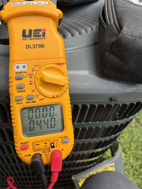 # HVAC Cooling Maintenance Service

Performed comprehensive preventive maintenance on residential air conditioning system as part of recurring service plan. Conducted electrical diagnostics using calibrated digital multimeter to verify proper voltage and amperage readings across system components, ensuring all electrical parameters met manufacturer specifications. Completed thorough inspection of outdoor condensing unit, including examination of cabinet integrity, louver vents, and coil condition. All components found operating within normal parameters with no visible damage, deterioration, or performance issues identified. Unit exterior showed appropriate weathering for outdoor equipment with paint finish and structural elements intact.