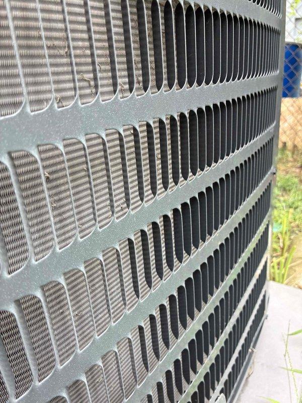 # HVAC Cooling Maintenance Service

Performed comprehensive preventive maintenance on residential air conditioning system as part of recurring service plan. Conducted electrical diagnostics using calibrated digital multimeter to verify proper voltage and amperage readings across system components, ensuring all electrical parameters met manufacturer specifications. Completed thorough inspection of outdoor condensing unit, including examination of cabinet integrity, louver vents, and coil condition. All components found operating within normal parameters with no visible damage, deterioration, or performance issues identified. Unit exterior showed appropriate weathering for outdoor equipment with paint finish and structural elements intact.