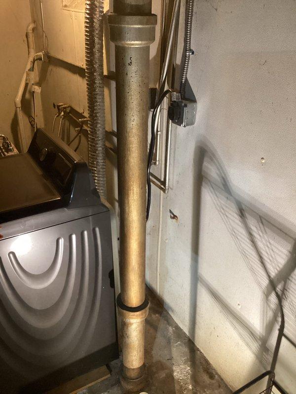 Responded to a leak between the toilet supply line and main plumbing stack. Inspected vertical drain pipe in basement utility area and overhead plumbing connections in crawl space, identifying compromised joint connections causing water seepage. Repaired leaking pipe fittings and secured all connections to restore proper function and prevent further water damage.