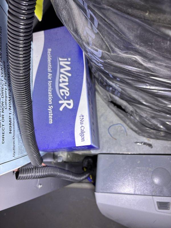 Presented customer with multiple equipment replacement options including individual AC unit replacement and complete HVAC system upgrade. Evaluated existing Tempstar furnace installation with connected ductwork, condensate drainage system, and residential air ionization system. Documented current equipment configuration including flexible ductwork, PVC venting, and accessory components to provide accurate replacement recommendations.