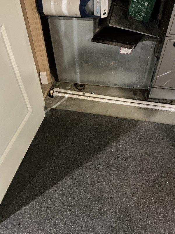 Conducted comprehensive assessment of existing Bryant HVAC system and water heater installation located in interior mechanical closet. Documented current equipment condition, including air handler with visible dust accumulation on interior surfaces, condensate drain line configuration, and overall system accessibility. Evaluated replacement options and provided customer with equipment upgrade recommendations based on existing installation parameters and spatial constraints.