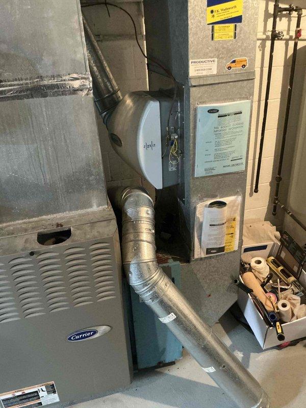 Completed comprehensive estimate for full HVAC system replacement of 20-year-old Carrier furnace and associated equipment. Evaluated existing system including furnace, ductwork, refrigerant lines, and auxiliary components such as humidifier, documenting current condition with photographic evidence showing normal wear, dust accumulation, and age-related deterioration. Presented customer with multiple replacement options including furnace configurations to address end-of-service-life equipment.