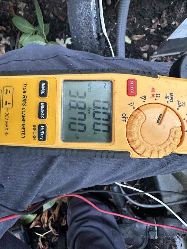 Completed scheduled preventive maintenance on residential cooling system. Inspected and serviced HVAC unit including filter examination in air handler compartment where multiple pleated filters were found properly installed in housing. Performed electrical diagnostics using clamp meter on outdoor condenser unit, verifying amperage draws and electrical connections. System operating within normal parameters with no deficiencies noted.