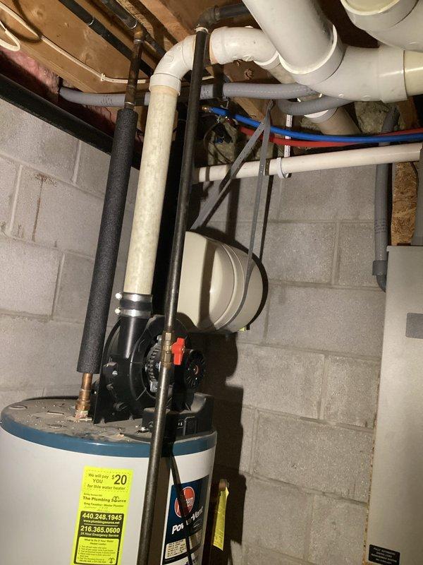 Responded to service call for tanked water heater producing high-pitched sound from exhaust system. Upon inspection, identified noise originating from exhaust vent piping and confirmed proper operation of water heater unit, pressure relief valve, and all plumbing connections. Completed diagnostic assessment and documented equipment condition with photographic evidence.