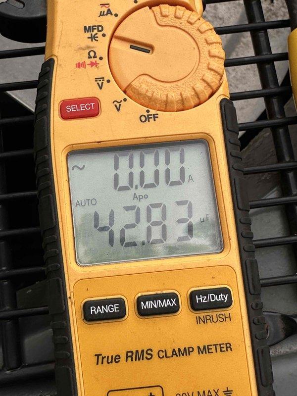 # HVAC Cooling Maintenance Summary

Completed routine preventive maintenance service on residential air conditioning system as part of ongoing cooling season maintenance program. Performed comprehensive electrical diagnostics using digital clamp meter to verify system amperage draw and frequency readings, confirming proper compressor and fan motor operation at 42.83 Hz. Inspected all electrical connections at condensing unit, including terminal blocks and wire terminations, verifying secure connections and proper torque specifications. All electrical components showed normal operational parameters with no immediate service concerns identified. System operating within manufacturer specifications upon completion of maintenance visit.