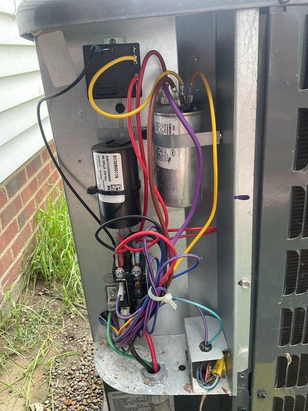 Completed routine cooling maintenance on residential HVAC system. Inspected indoor furnace unit and outdoor condensing unit, verified proper operation of dual-run capacitors and contactor assembly, checked electrical connections and wiring integrity, and confirmed system components are functioning within normal parameters for continued reliable cooling operation.