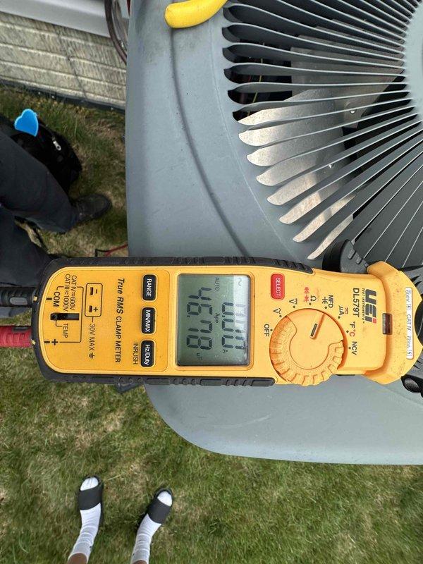 Performed comprehensive cooling system maintenance on outdoor condensing unit. Conducted electrical diagnostics using digital multimeter, measuring voltage and amperage readings to verify proper system operation and component performance. All measurements indicated equipment operating within normal parameters. Unit inspected and confirmed functioning properly.