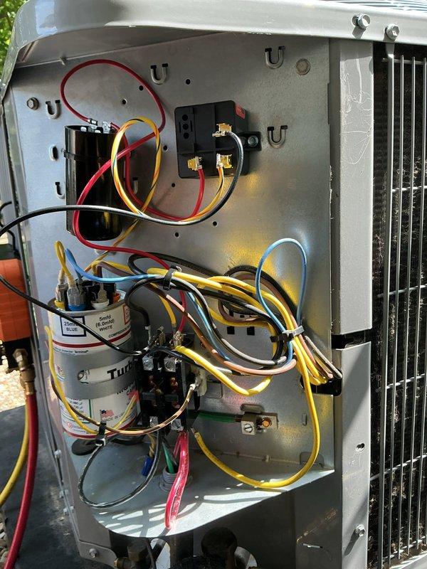 Performed warranty compressor replacement on outdoor HVAC unit, including installation of new filter drier to ensure system cleanliness. Thoroughly inspected and verified all electrical wiring connections, then replaced contactor, capacitor, and complete start component hardware kit to manufacturer specifications. System was pressure-tested with manifold gauges to confirm proper refrigerant charge and operational parameters upon completion.