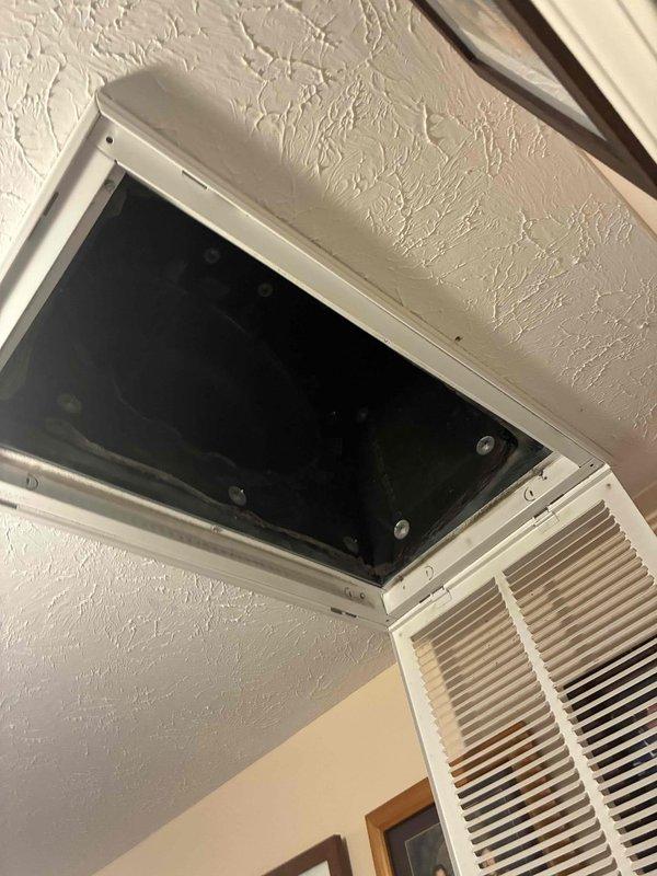 Completed scheduled preventive maintenance on residential cooling system as part of ongoing service plan. Performed comprehensive inspection of air handler components including supply and return air grilles, verified proper airflow through ceiling-mounted distribution system. Inspected and tested dual-run capacitor with connected compressor and fan motor leads, confirmed proper electrical connections and terminal integrity on all three wire terminals. All system components found operating within normal parameters with no deficiencies noted.