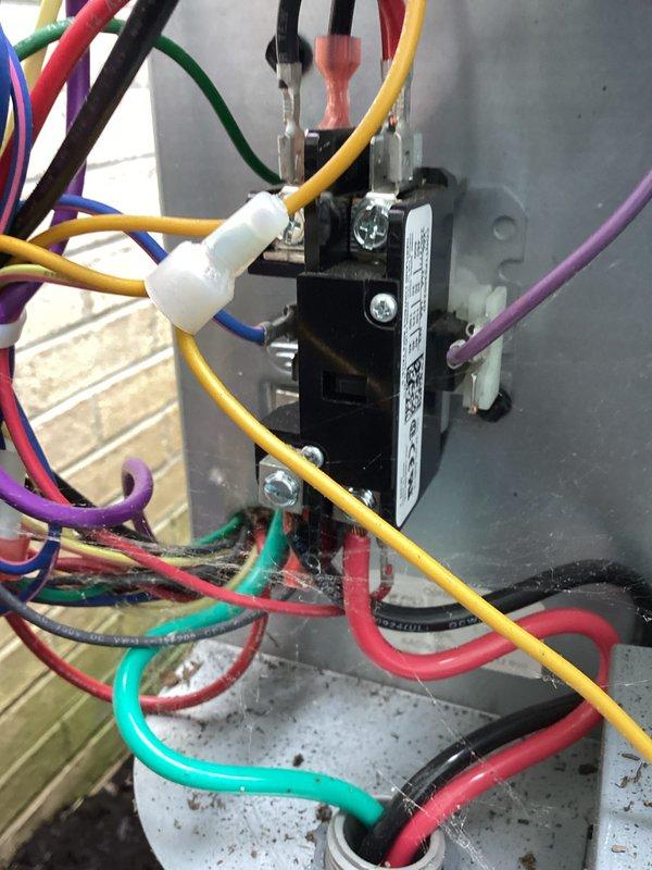 Completed scheduled preventive maintenance on residential cooling system. Performed electrical diagnostics using digital multimeter to verify proper voltage and amperage at contactor and control circuits. Inspected all electrical connections, terminal blocks, and wiring integrity at the contactor assembly, confirming secure connections and proper operation of all components.