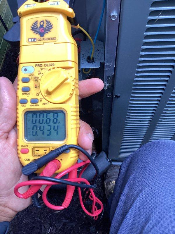 Completed scheduled preventive maintenance on residential cooling system. Performed electrical diagnostics using digital multimeter to verify proper voltage and amperage at contactor and control circuits. Inspected all electrical connections, terminal blocks, and wiring integrity at the contactor assembly, confirming secure connections and proper operation of all components.