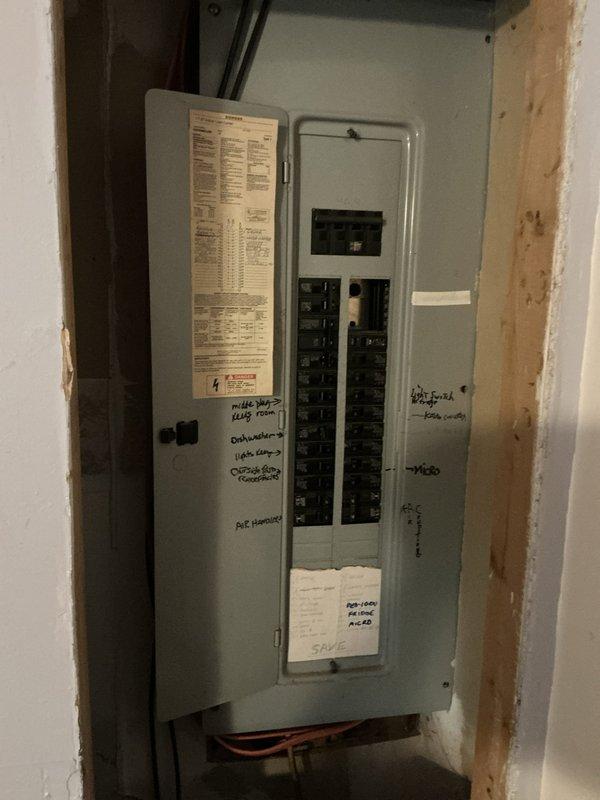 Conducted on-site evaluation for Generac generator installation. Documented existing electrical panel configuration, including main breaker panel with dual-column circuit breaker arrangement and current circuit distribution. Assessed panel capacity, available breaker slots, and electrical infrastructure to determine requirements for generator integration and transfer switch installation.